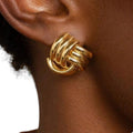 ARETES TRIPLE NUDO DORADOS