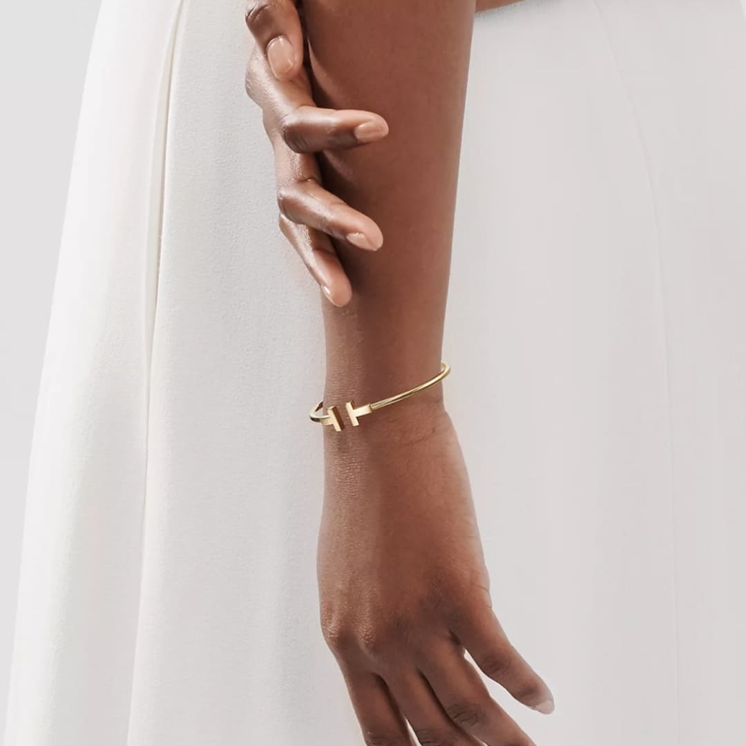 PULSERA T DORADA